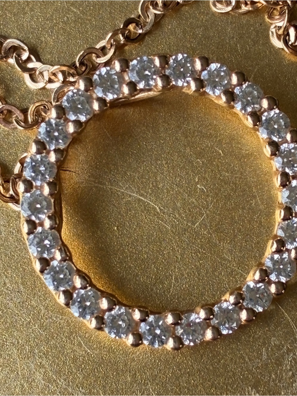 14K Gold Circle Pendant Necklace with 22 small Diamonds